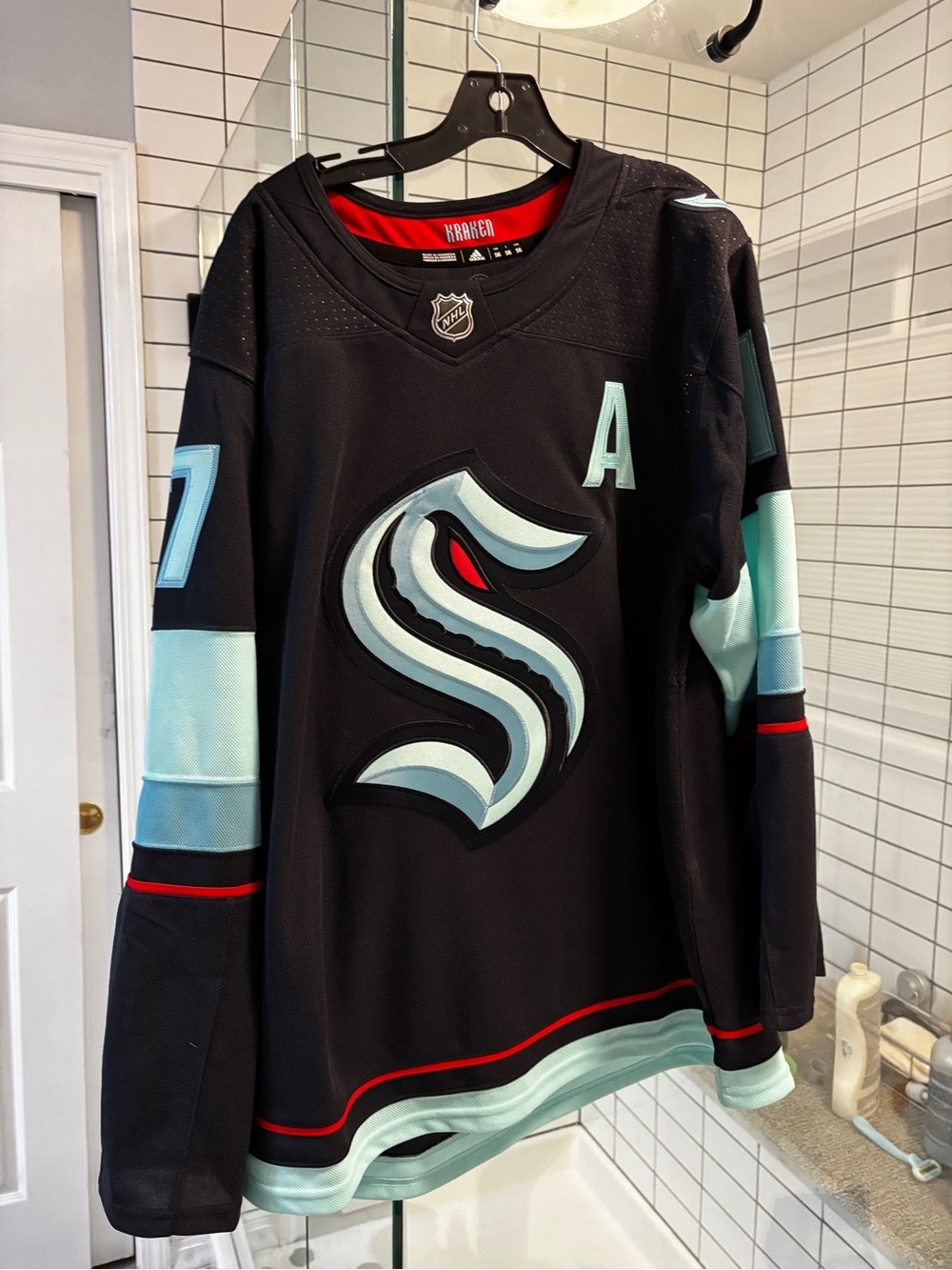 Rare Seattle Kraken Black Alternate NHL Jersey with A NWOT #17 collectable